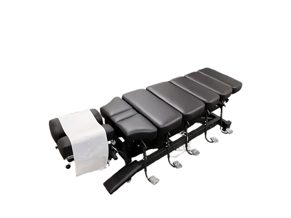 Chiropractic adjustment table with drop-away segments